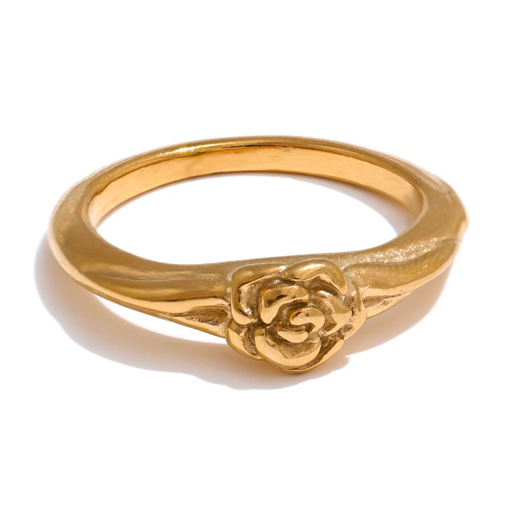 Gold-plated stainless steel ring with a rose design.
