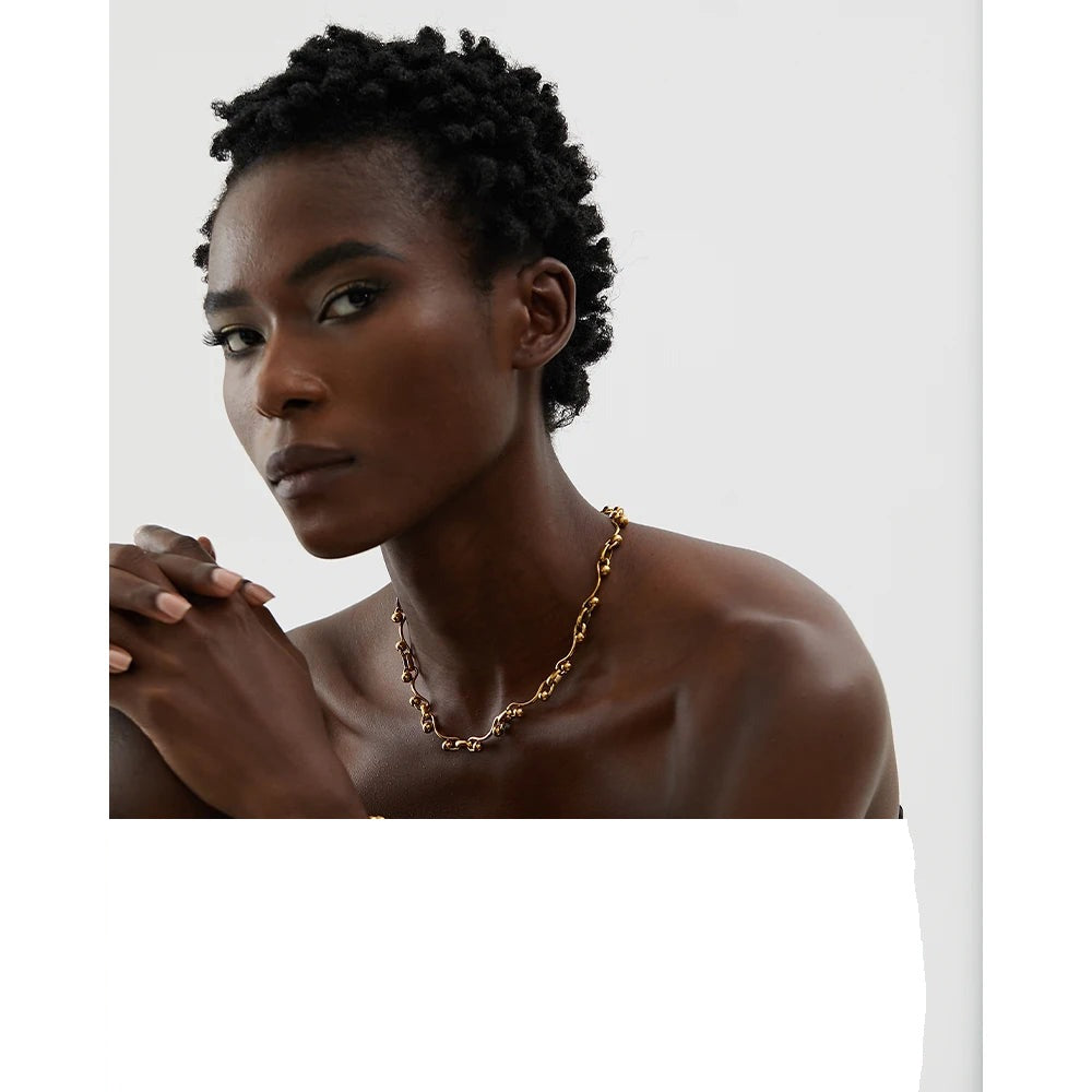 Geometric chain necklace in 18K gold-plated stainless steel.