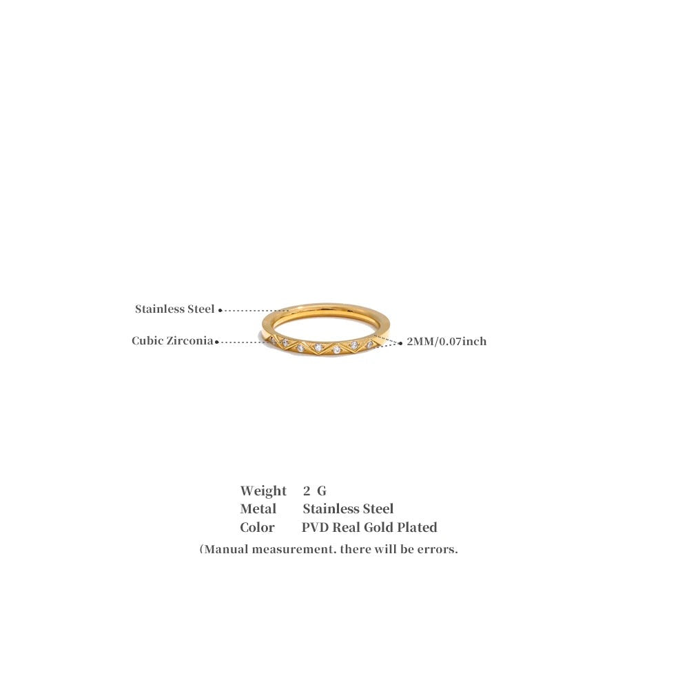 Cubic zirconia geometric ring in gold-plated stainless steel with cubic zirconia.