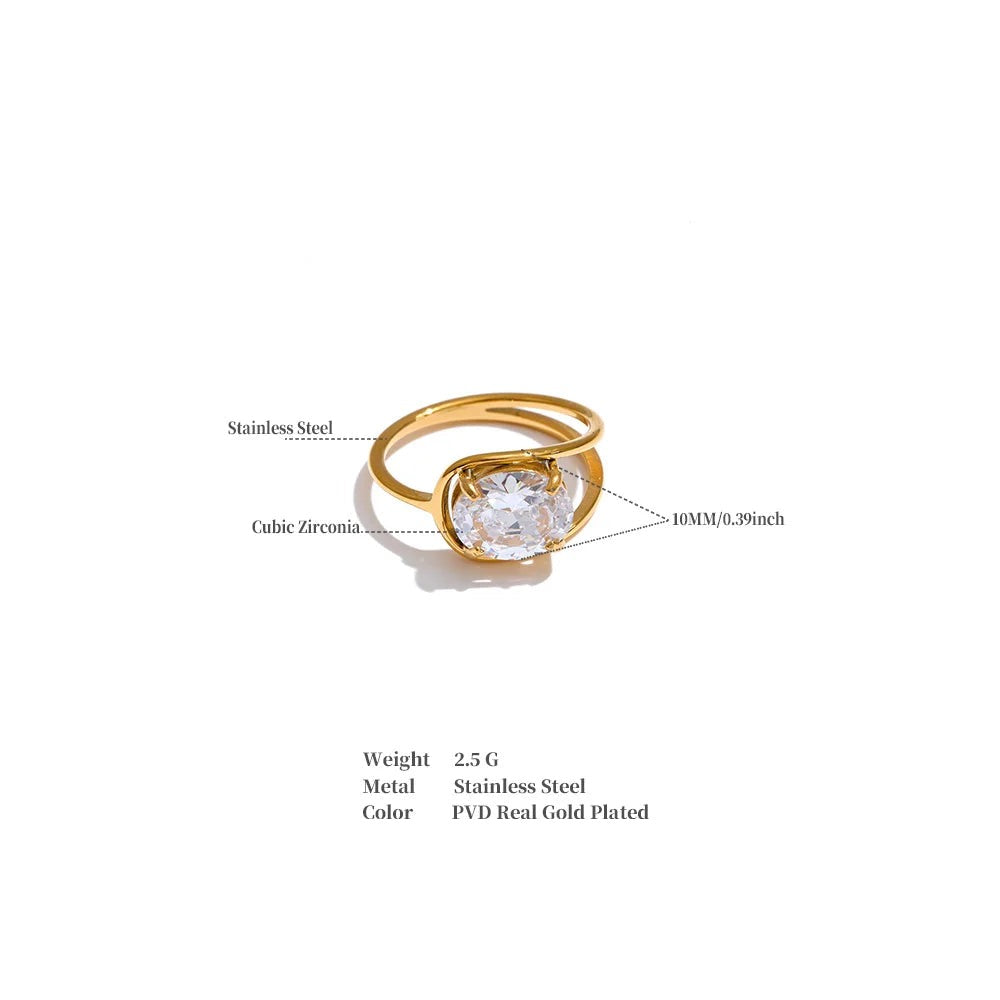 Cubic zirconia geometric ring in 18K gold-plated stainless steel with cubic zirconia.