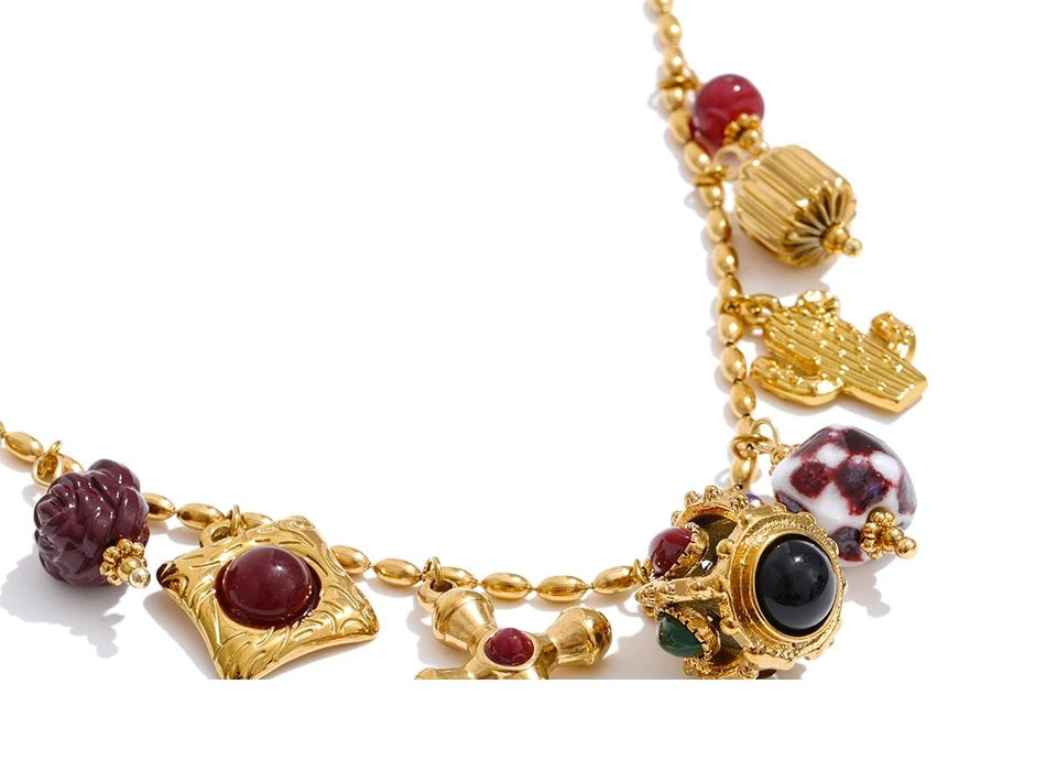 Resin acrylic cross necklace in gold-plated stainless steel with resin and acrylic.