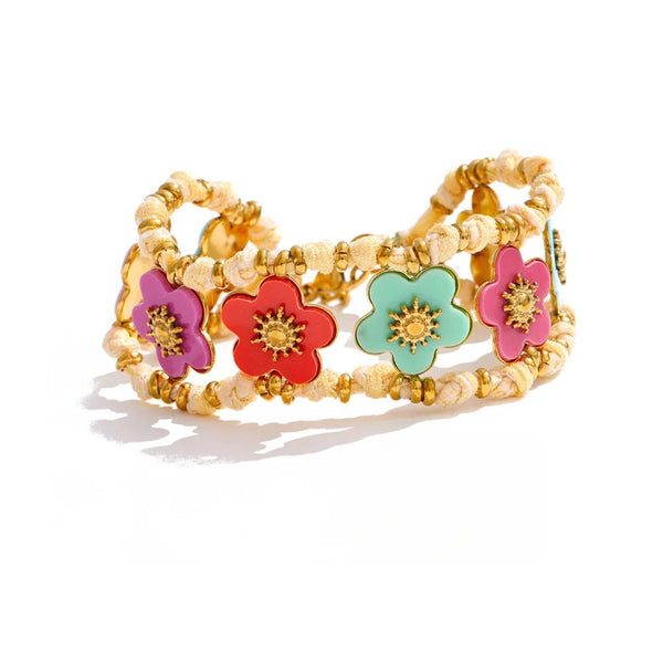 Gold-plated bracelet with resin flowers.