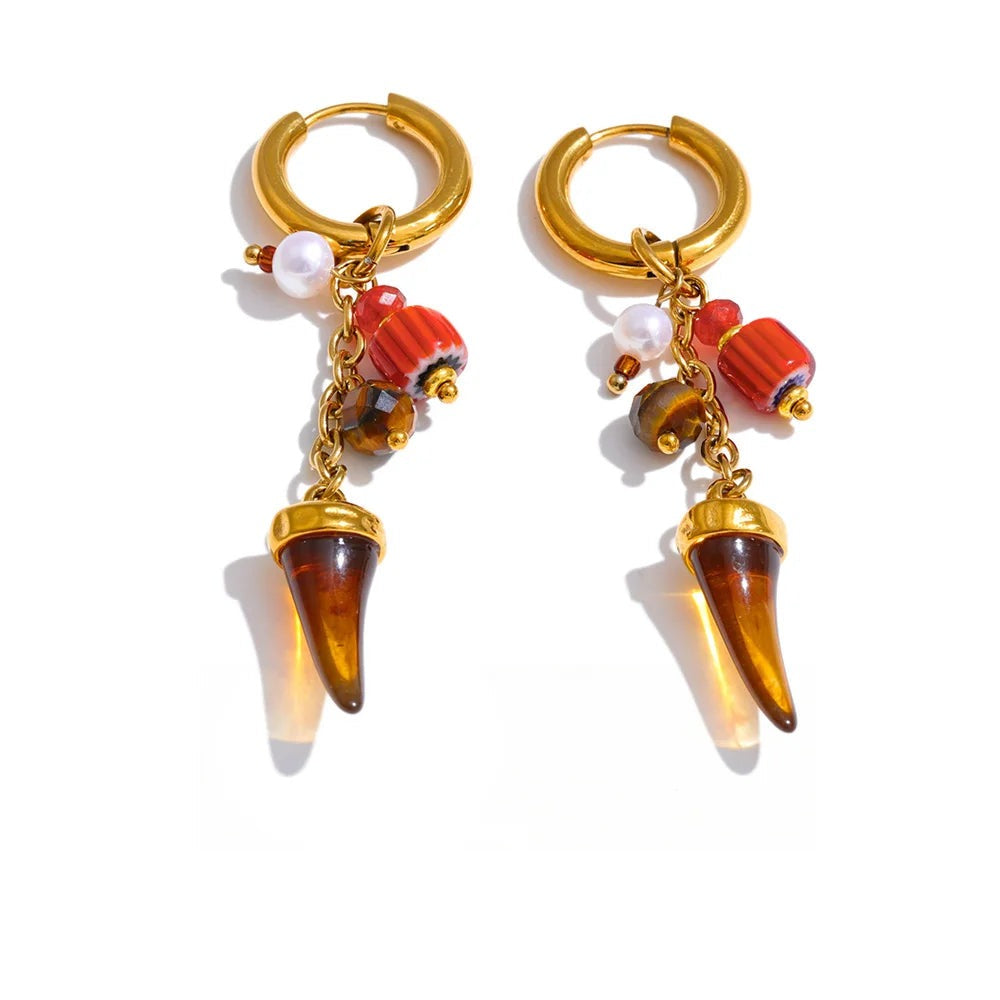 Gold-plated stainless steel earrings with resin.