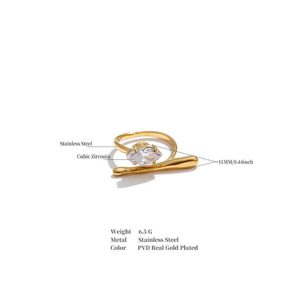 Cubic zirconia geometric ring in 18K gold-plated stainless steel with cubic zirconia.