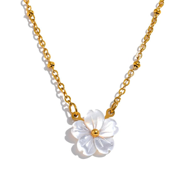 Gold-plated stainless steel necklace with a white flower pendant.