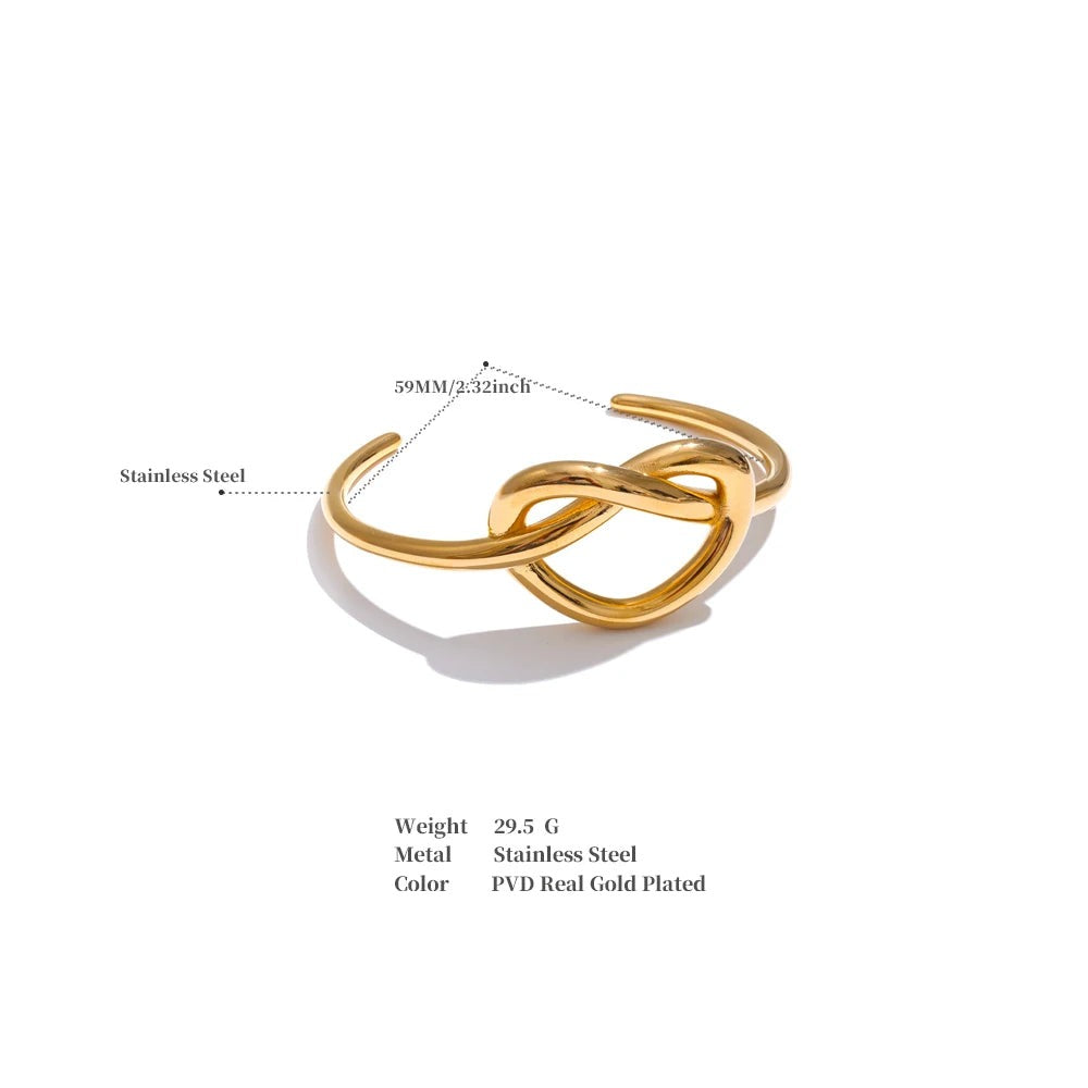 Heart bracelet in gold-plated stainless steel.