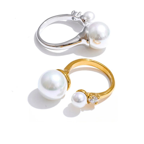 Gold-plated stainless steel ring with pearl and cubic zirconia.