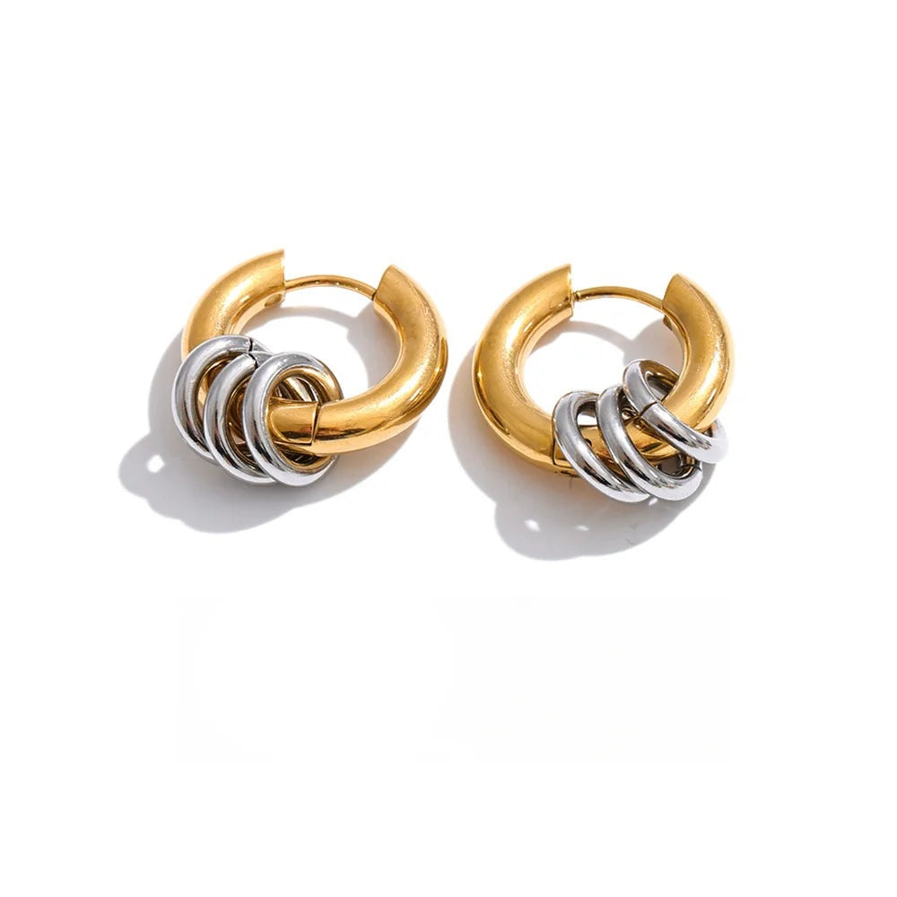 Gold-plated stainless steel earrings with a circular design.