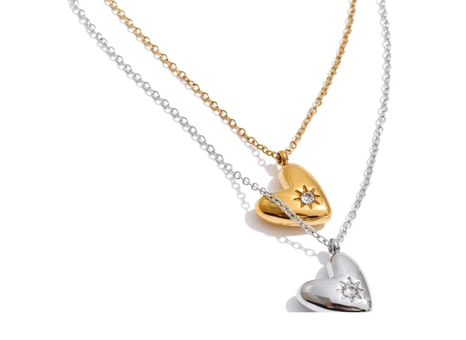 Cubic zirconia heart necklace in gold-plated stainless steel with cubic zirconia.