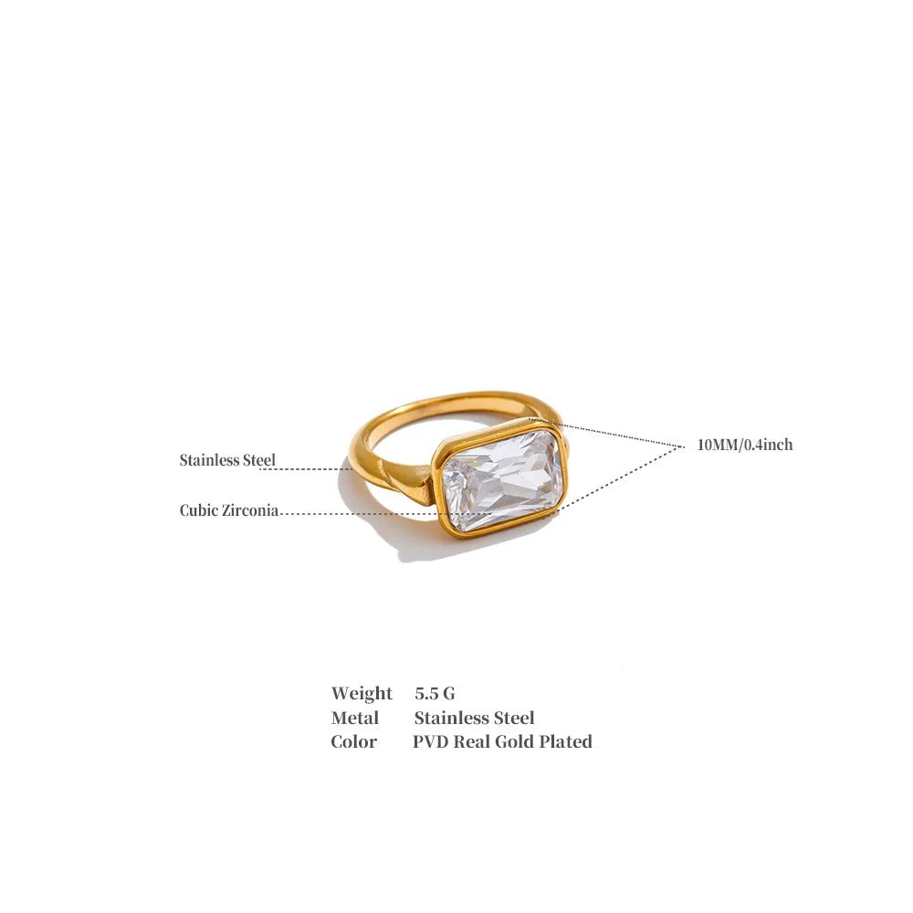 Cubic zirconia geometric ring in 18K gold-plated stainless steel with cubic zirconia.