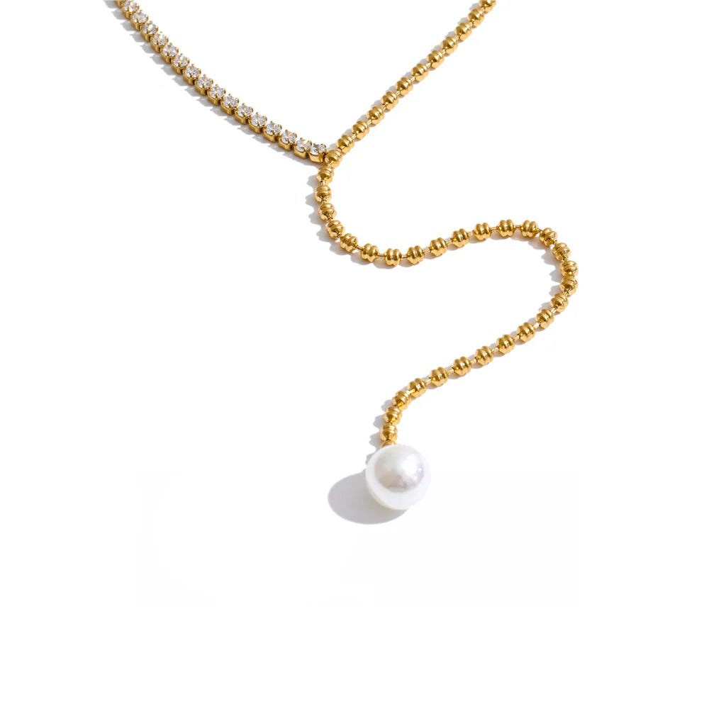 Gold-plated stainless steel necklace with pearl and cubic zirconia.