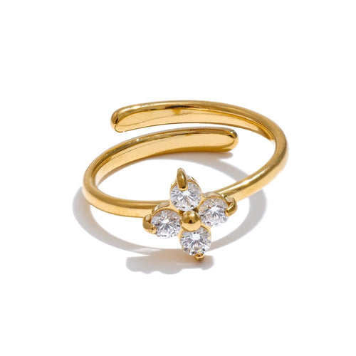 Gold-plated stainless steel ring with cubic zirconia flower design.