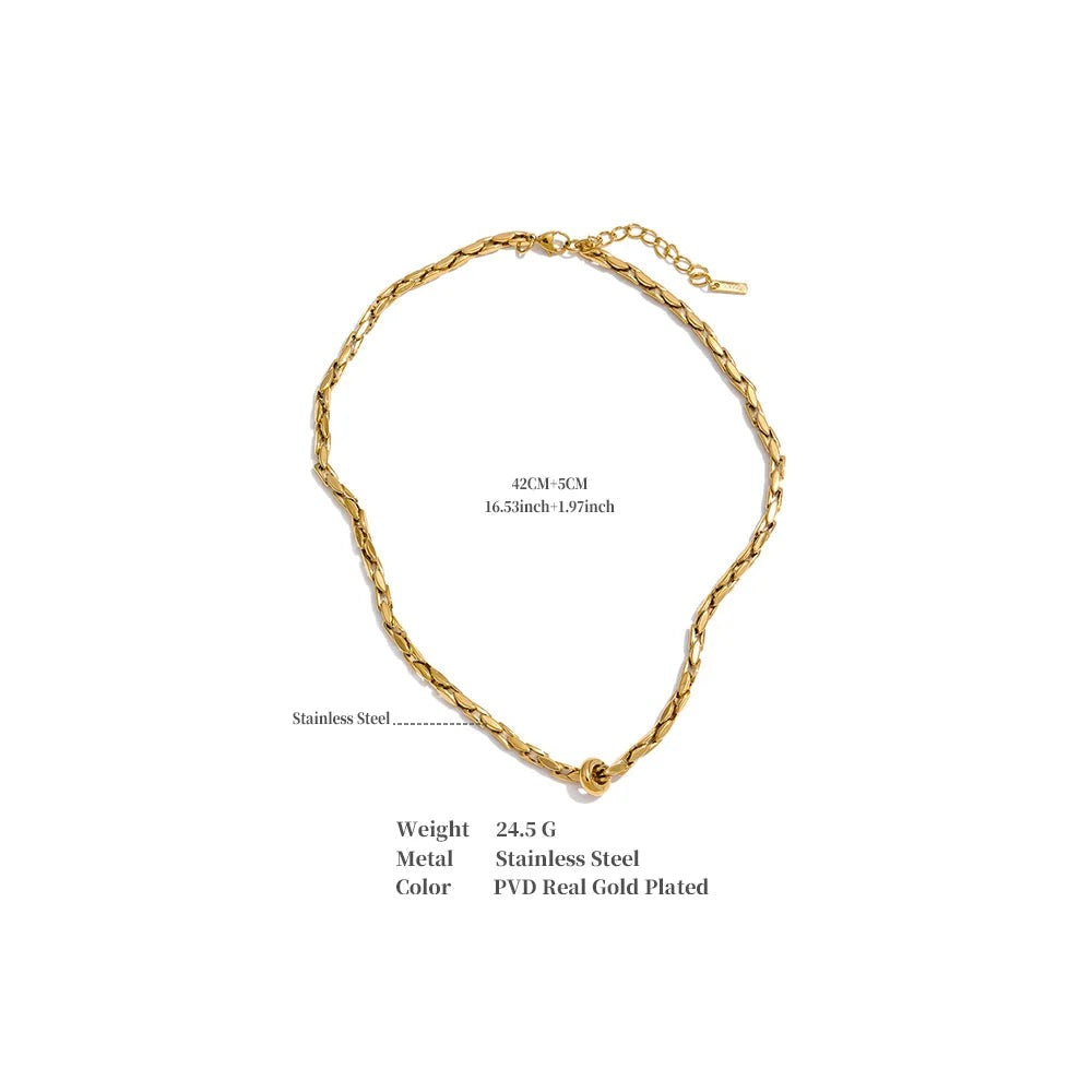 Geometric chain necklace in gold-plated stainless steel.