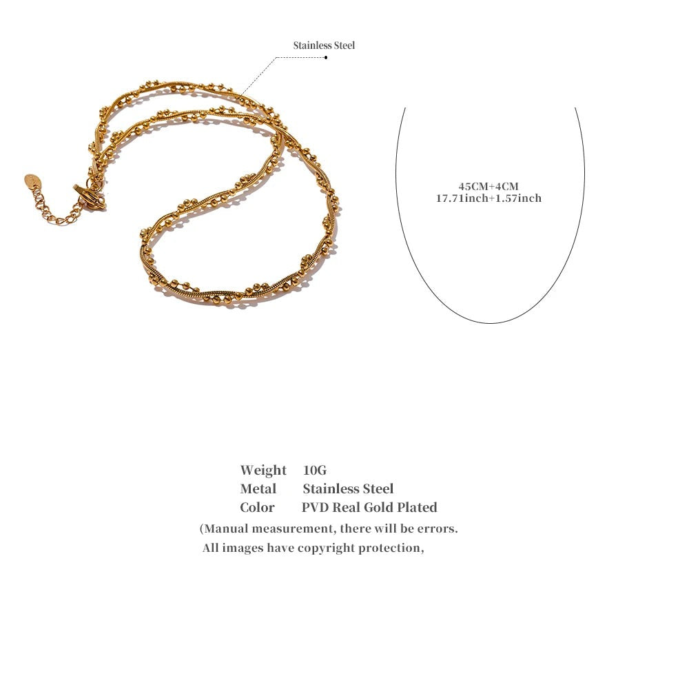 Geometric chain necklace in gold-plated stainless steel.