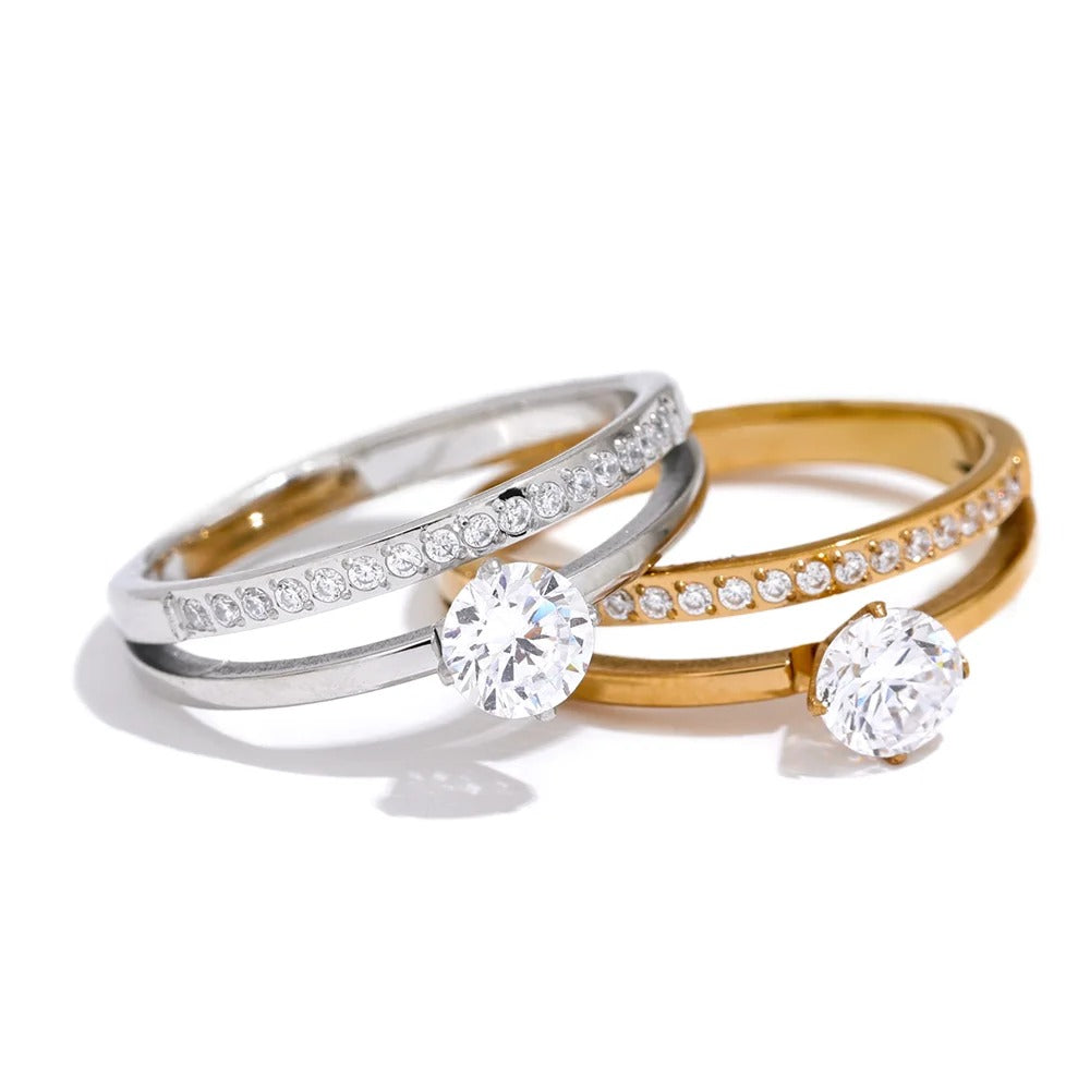 Gold-plated stainless steel ring with cubic zirconia stones.