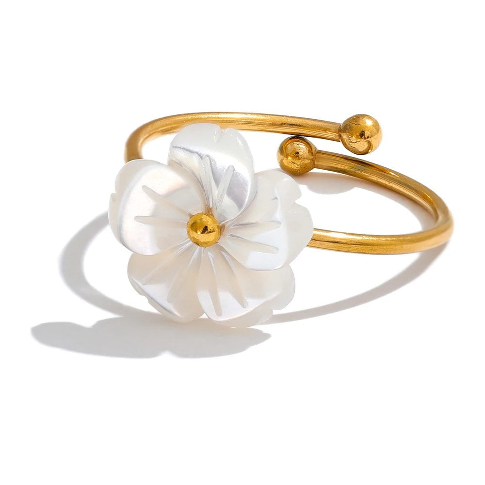 Gold-plated stainless steel ring with shell flower accent.