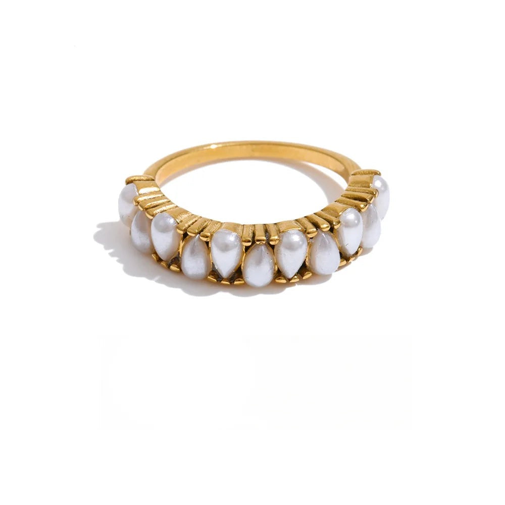 Gold-plated ring with pearls.
