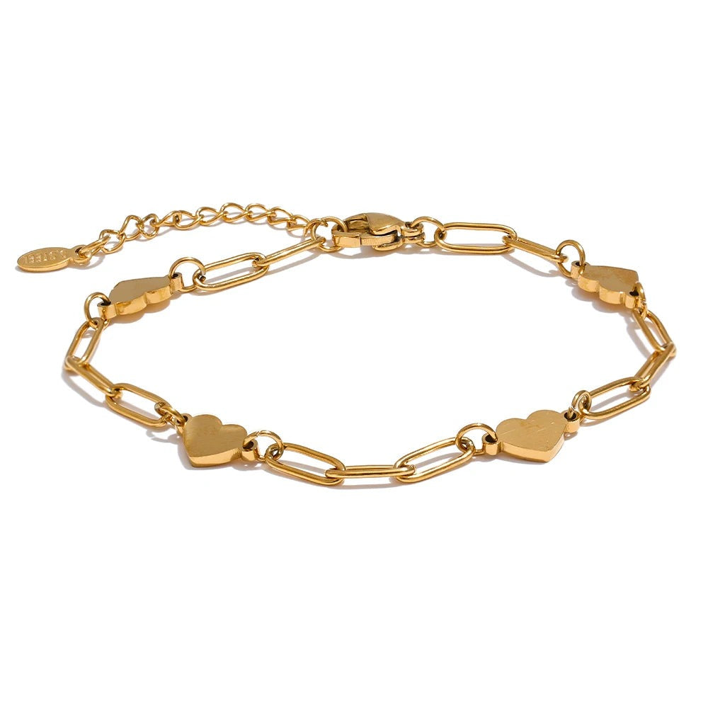 Gold-plated stainless steel bracelet with a heart pendant.