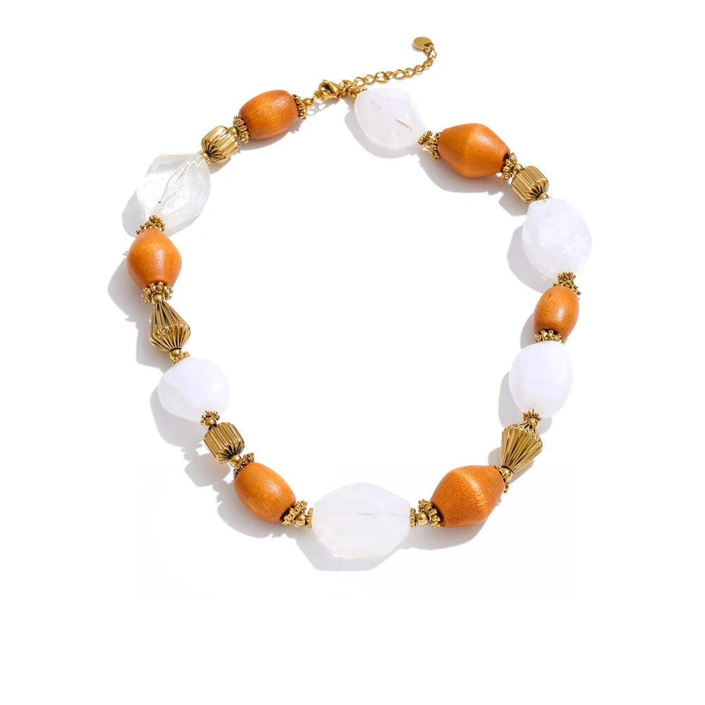 Gold-plated stainless steel necklace with resin beads featuring orange stones.