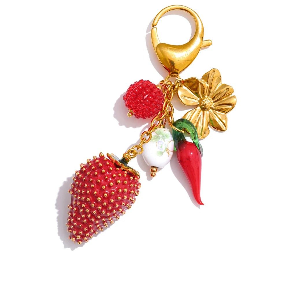 Gold-plated stainless steel necklace with red strawberries and flowers.