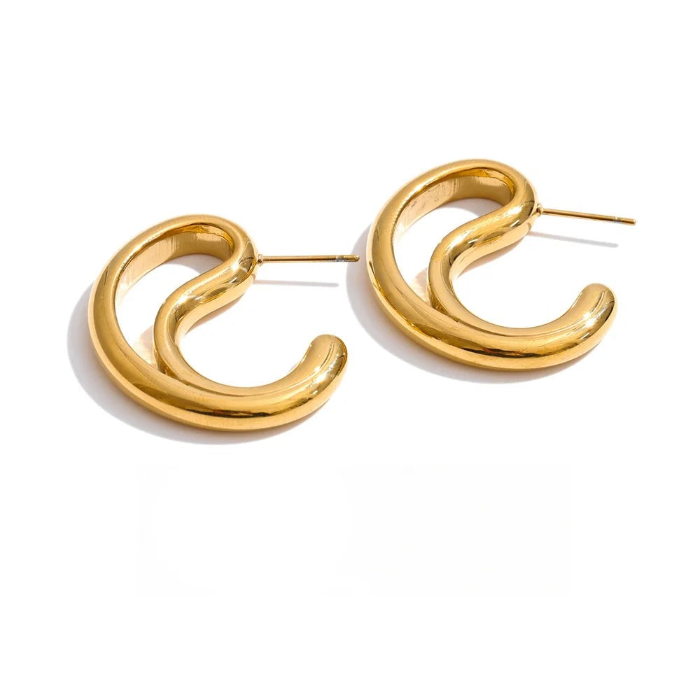 Gold-plated stainless steel earrings with a large hoop design.