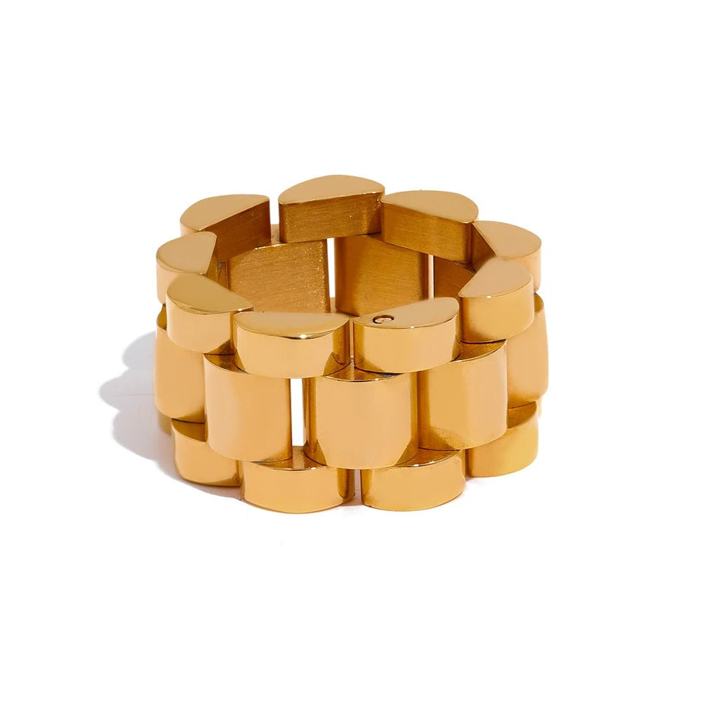 Gold-plated stainless steel ring with a hexagonal pattern.