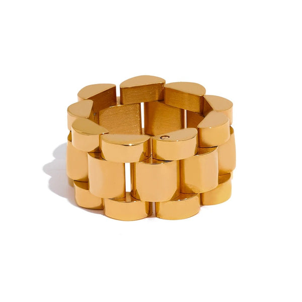 Gold-plated stainless steel ring with a hexagonal pattern.