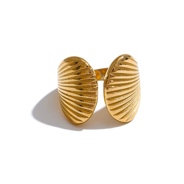 Gold-plated stainless steel ring with shell design.