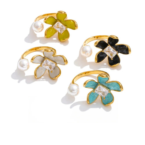 Gold-plated stainless steel ring with cubic zirconia and enamel flowers.