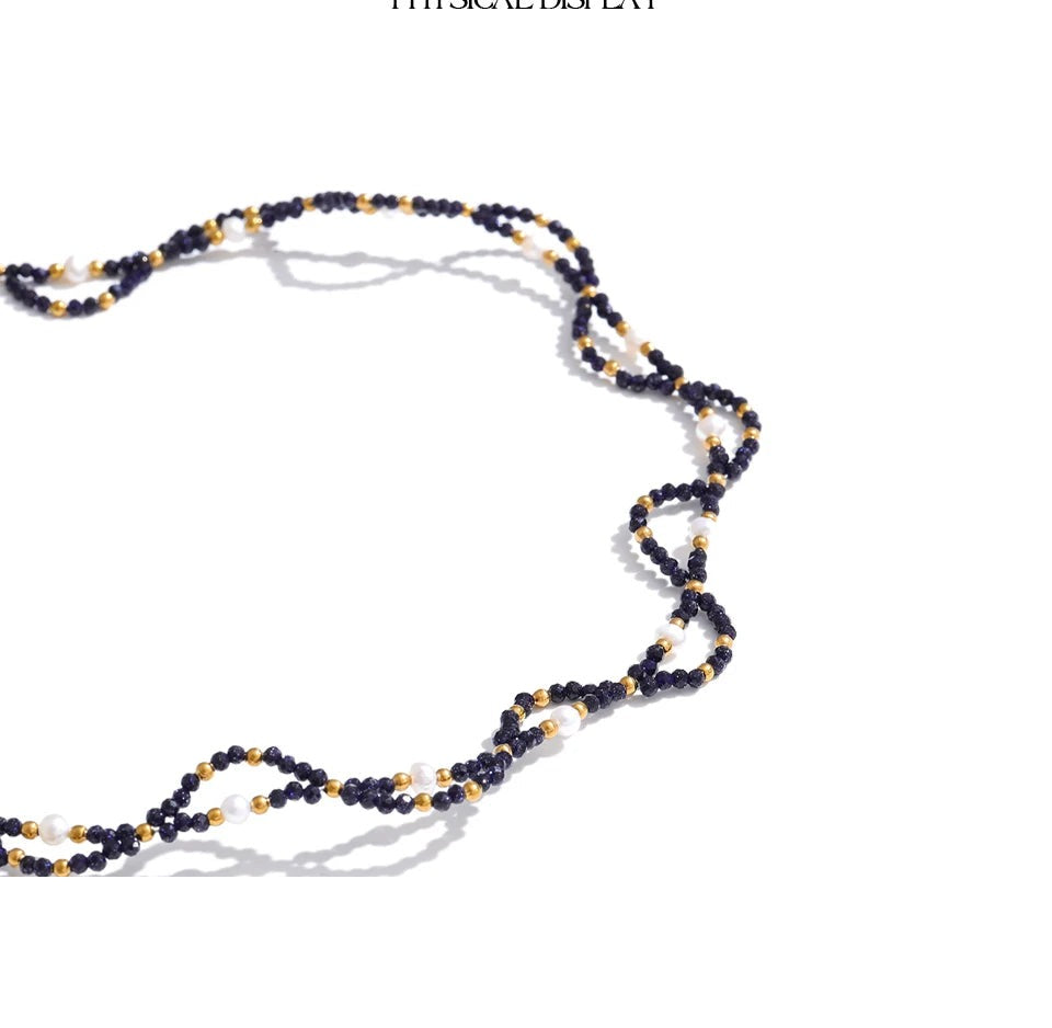 Pearl natural stone beaded necklace in gold-plated stainless steel with pearl and natural stone.