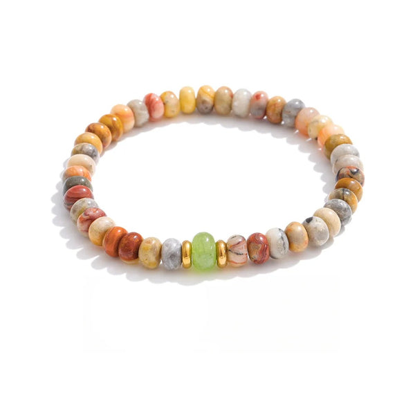 Bracelet made of gold-plated stainless steel with natural stone beads.