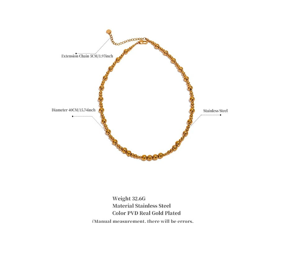 Beaded geometric chain necklace in gold-plated stainless steel.
