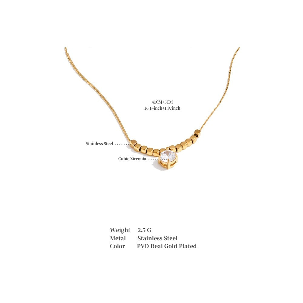 Cubic zirconia beaded geometric necklace in gold-plated stainless steel with cubic zirconia.