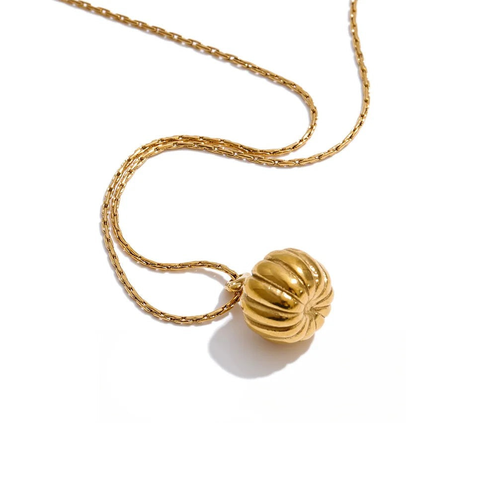 Gold-plated stainless steel necklace with a spherical pendant.