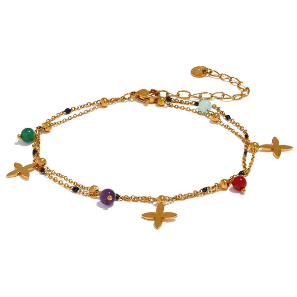 Gold-plated anklet with natural stone accents and a cross charm.