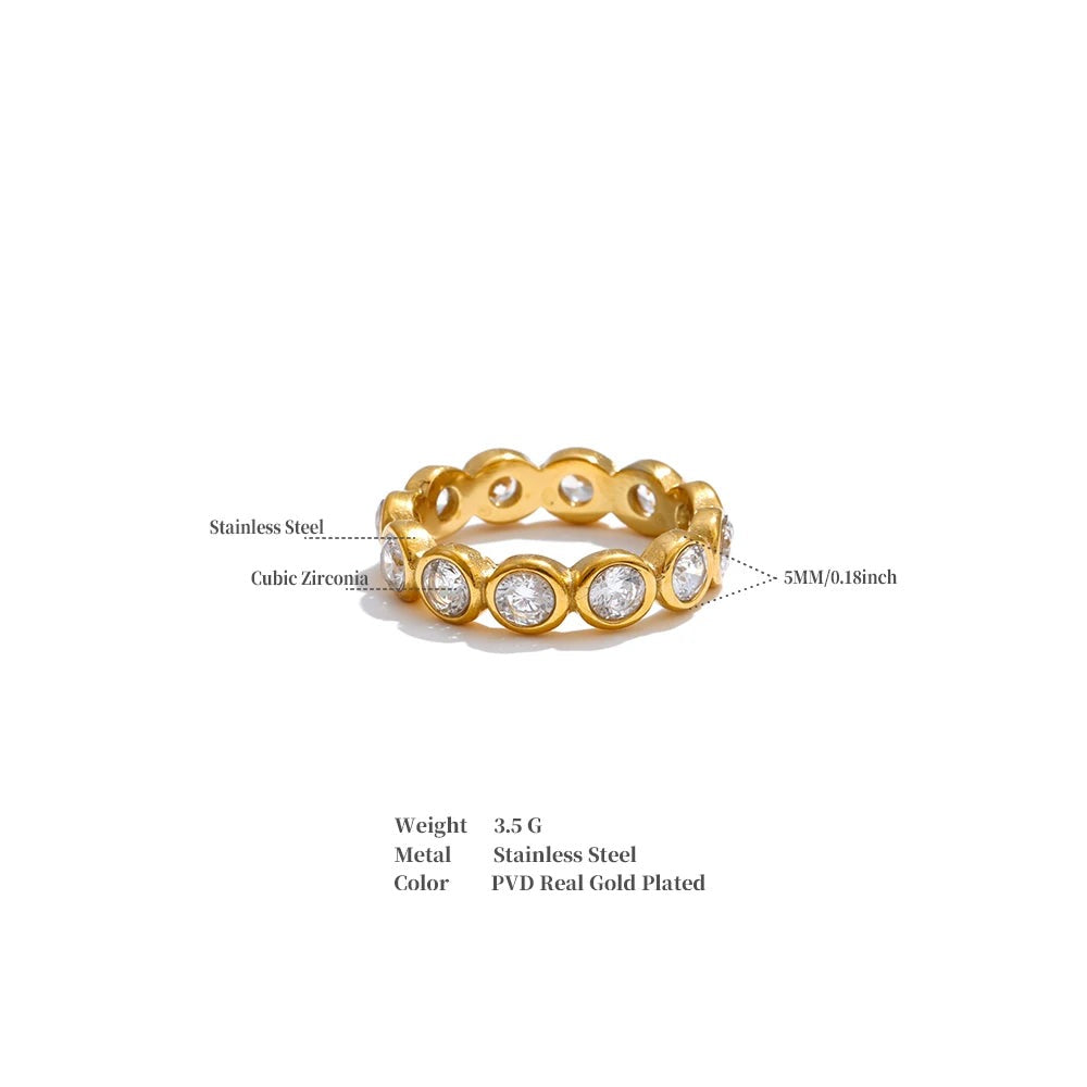 Cubic zirconia geometric ring in 18K gold-plated stainless steel with cubic zirconia.