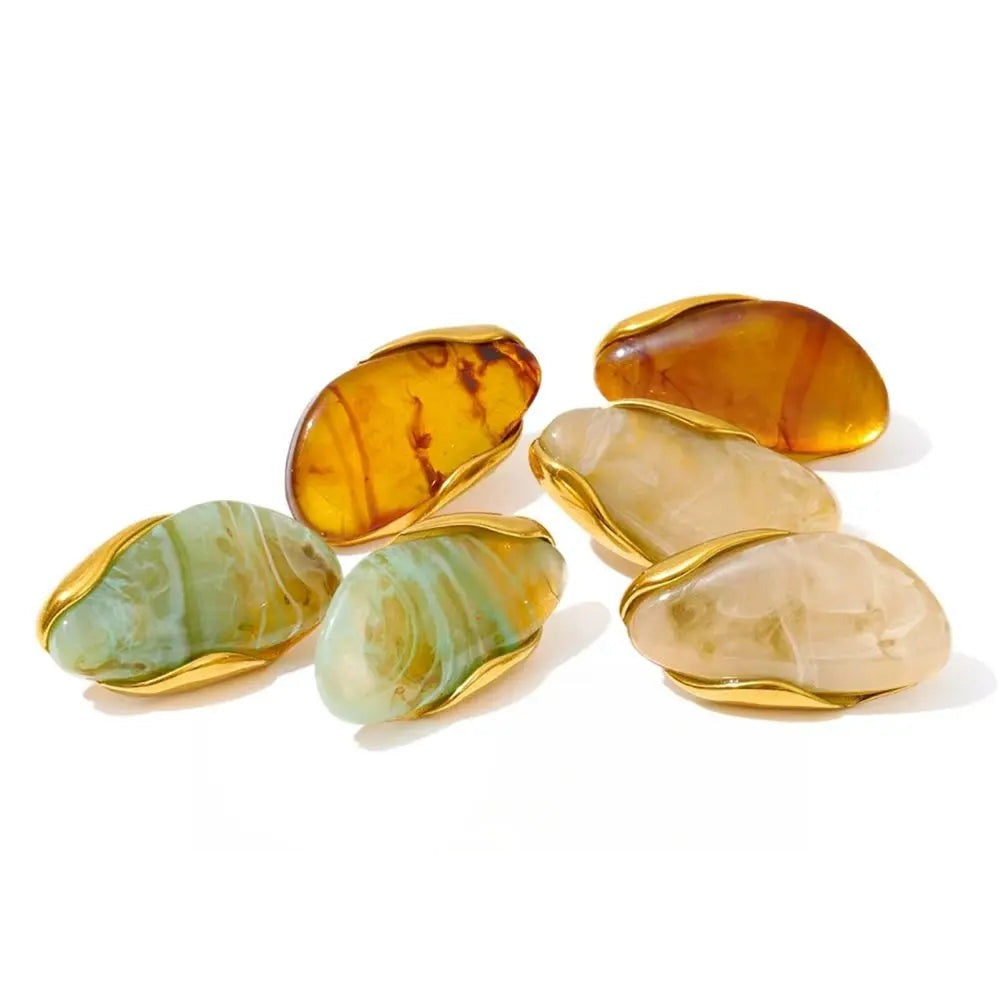 Gold-plated stainless steel earrings with resin.