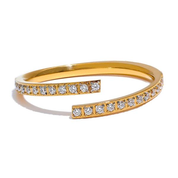 Gold-plated stainless steel ring with cubic zirconia stones.