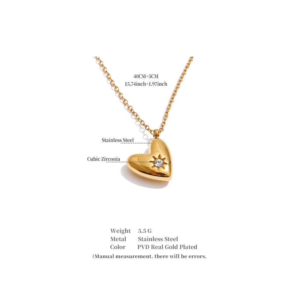Cubic zirconia heart necklace in gold-plated stainless steel with cubic zirconia.
