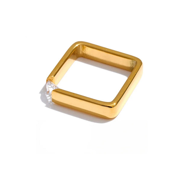 Gold-plated stainless steel ring with cubic zirconia.