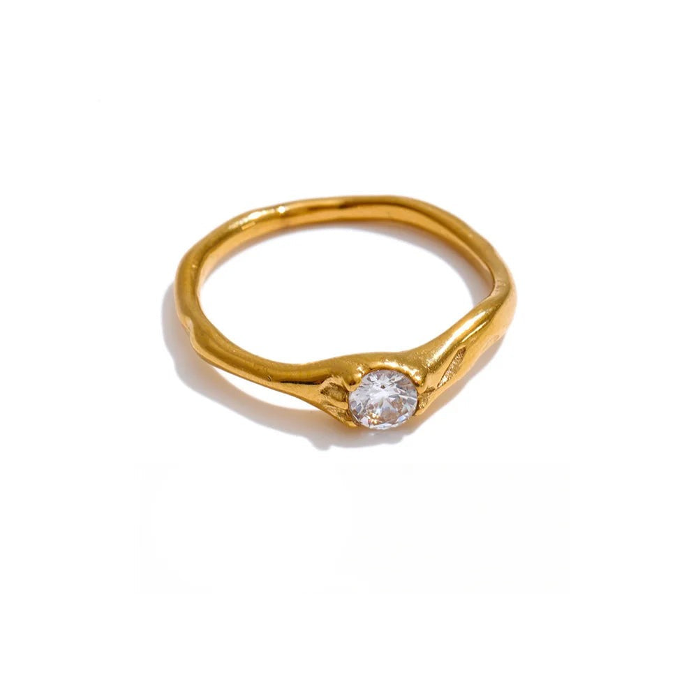 Gold-plated ring with cubic zirconia.