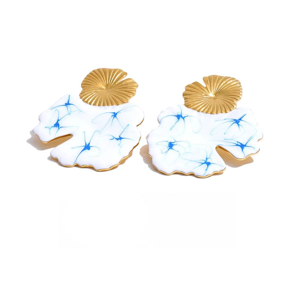 Gold-plated stainless steel earrings with enamel detailing a blue flower pattern.