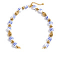 Blue flower beaded necklace in gold-plated stainless steel.