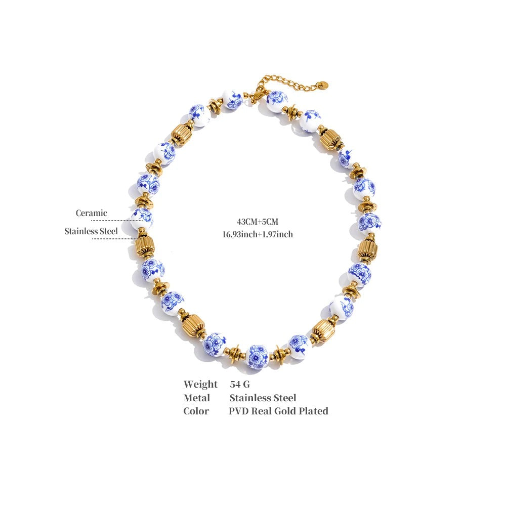 Blue flower beaded necklace in gold-plated stainless steel.