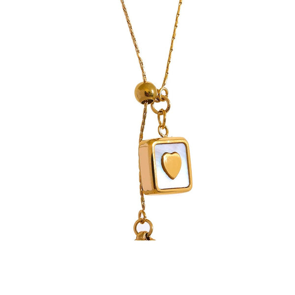 Gold-plated stainless steel necklace with a heart pendant.