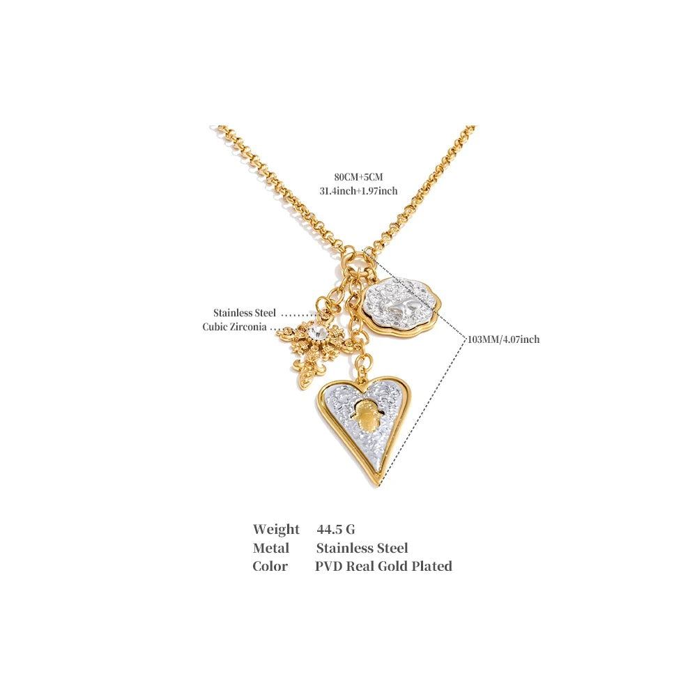 Heart cross necklace in gold-plated stainless steel.