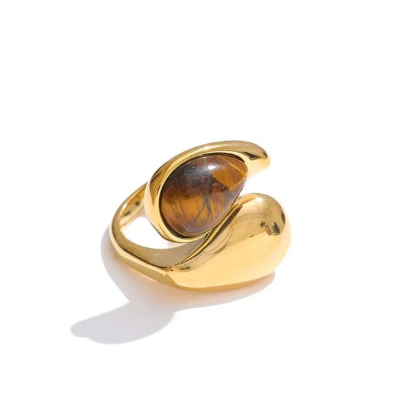 Gold-plated ring with a natural stone centerpiece.