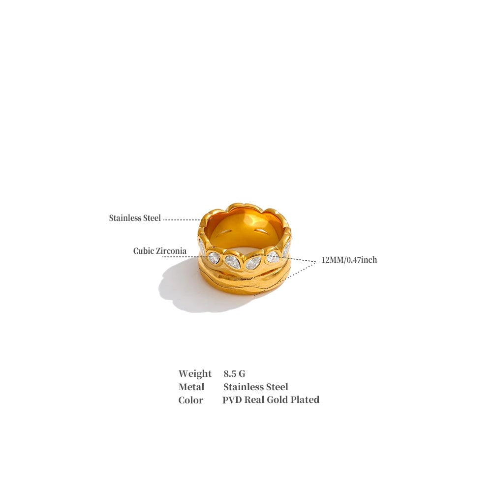 Cubic zirconia geometric ring in 18K gold-plated stainless steel with cubic zirconia.