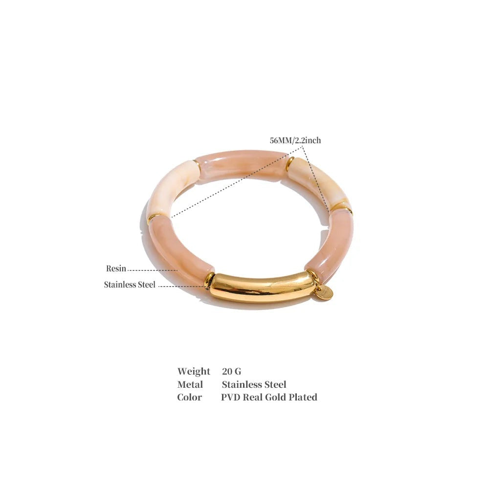 Resin acrylic geometric bracelet in gold-plated stainless steel with resin and acrylic.