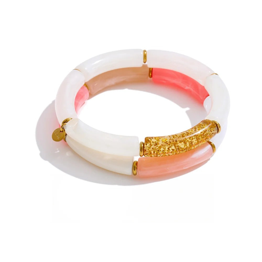 Bracelet made of gold-plated stainless steel with resin and acrylic.